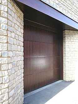Hormann timber sectional door with special vertical routing